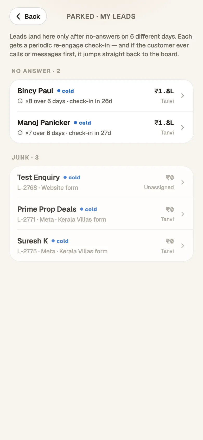 The parked screen on Android listing parked and junked leads with 'Restore'.