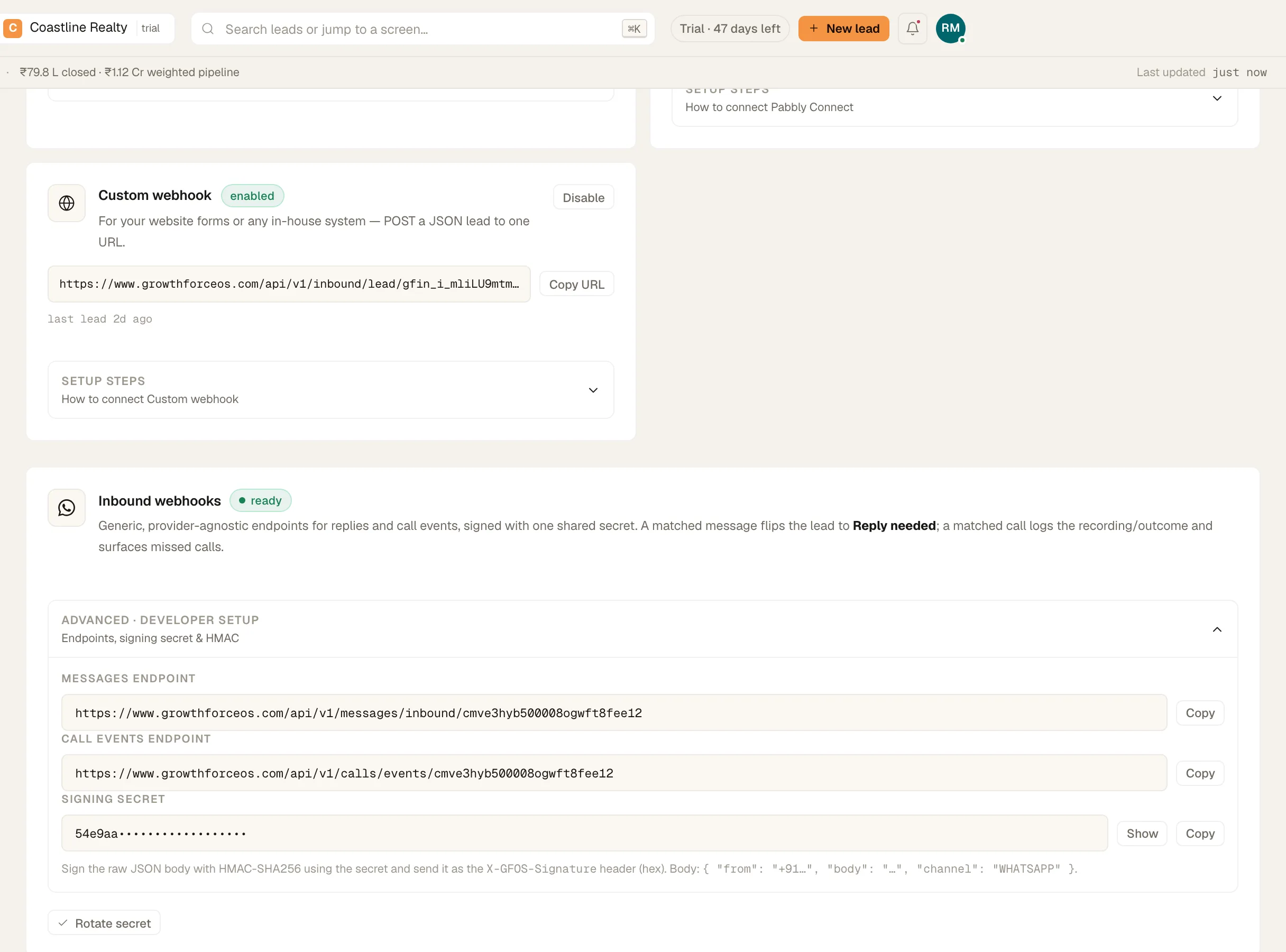 The Custom webhook card with 'Copy URL', and the Inbound webhooks card with a masked secret and 'Rotate secret'.